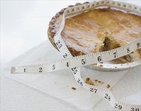 Close up of pie and tape measure. Date : 2006