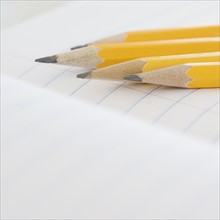 Close up of pencils on notebook. Date : 2006