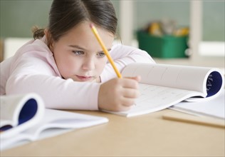 Girl studying in classroom. Date : 2006