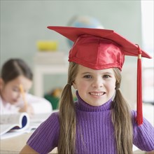 Portrait of girl wearing graduation cap. Date : 2006