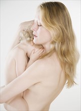 Nude portrait of mother and child. Date : 2006
