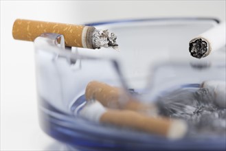 Closeup of cigarettes in ashtray. Date : 2006
