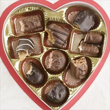Still life of heart shaped box of chocolates. Date : 2006