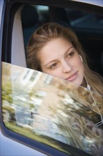 Female passenger sitting in car. Date : 2006