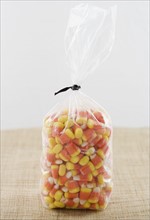 A bag full of candy corn. Date : 2006