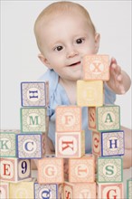 Baby playing with blocks. Date : 2007