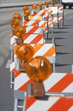 Row of traffic barricades with lights. Date : 2007