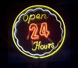 open 24 hours neon sign. Date : 2007