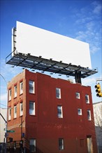Blank billboard on urban building. Date : 2007