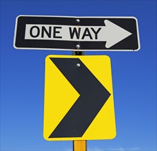 One Way and arrow street signs. Date : 2007