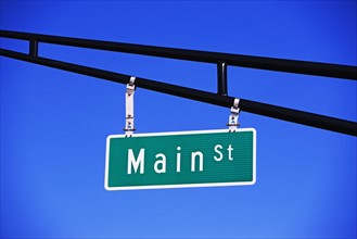 Main Street sign under blue sky. Date : 2007