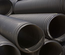 Stack of large metal pipes. Date : 2007