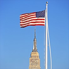 American flag over Empire State Building. Date : 2007
