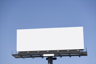 Blank billboard under blue sky. Date : 2007