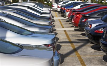 Rows of new cars on lot. Date : 2007