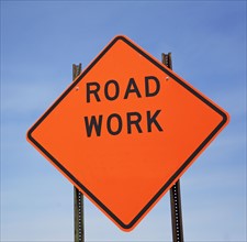 Low angle view of Road Work sign. Date : 2007