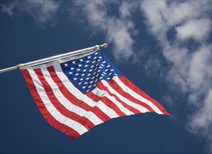 American flag under blue sky. Date : 2007