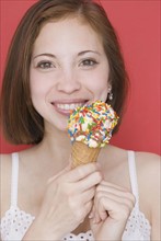 Woman eating ice cream cone. Date : 2007