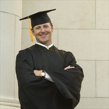 Male graduate with arms crossed. Date : 2007