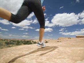 Woman jogging in desert. Date : 2007