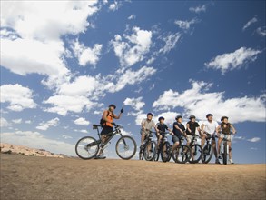 Group of cyclists in desert. Date : 2007