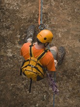 Man rappeling down cliff. Date : 2007