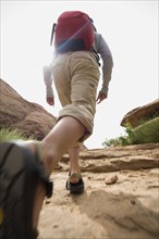 Woman hiking in desert. Date : 2007