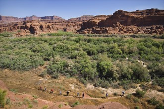 People hiking in canyon, Canyonlands National Park, Moab, Utah, United States. Date : 2007