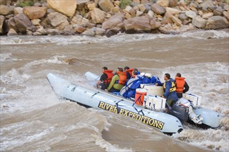 People on white water rafting tour, Colorado River, Moab, Utah, United States. Date : 2007