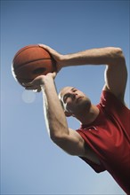 Man shooting basketball. Date : 2007