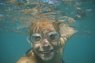 Underwater shot of boy swimming, Utah, United States. Date : 2007