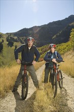 Senior couple on mountain bikes, Utah, United States. Date : 2007