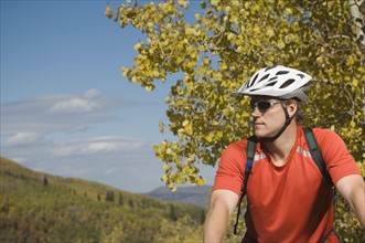 Man wearing bicycle helmet, Utah, United States. Date : 2007