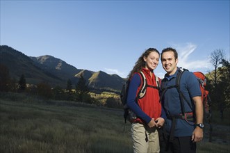 Couple wearing backpacks outdoors, Utah, United States. Date : 2007
