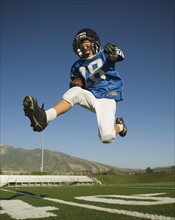 Young football player jumping. Date : 2007
