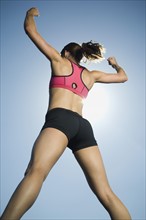Rear view of woman in athletic gear. Date : 2007