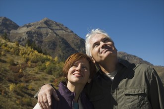 Senior couple hugging outdoors, Utah, United States. Date : 2007