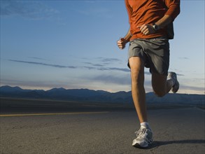 Man in athletic gear running. Date : 2007