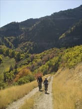 Senior couple riding mountain bikes, Utah, United States. Date : 2007
