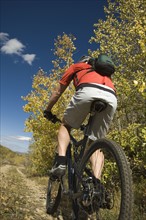 Person riding mountain bike, Utah, United States. Date : 2007