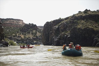 Groups of people river rafting. Date : 2007