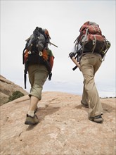People hiking with backpacks. Date : 2007