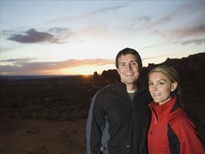 Couple in desert at dusk. Date : 2007