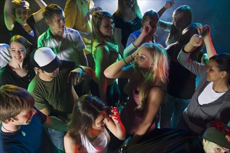 Young people at dance club. Date : 2007