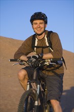 Man sitting on mountain bike. Date : 2007