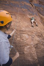 Two people rock climbing. Date : 2007