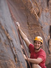 Close up of man rock climbing. Date : 2007