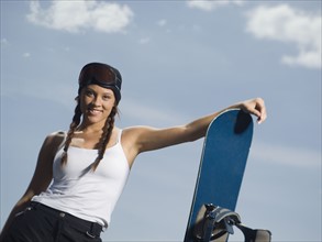 Snowboarder holding board. Date : 2007