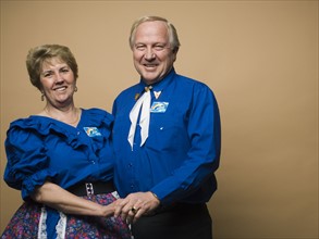 Senior couple in square dancing outfits. Date : 2007