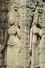 Carvings at ancient temple Angkor Wat Cambodia Khmer. Date : 2006